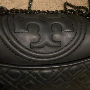 Tory Burch small Fleming matte black crossbody/shoulder bag. Used
